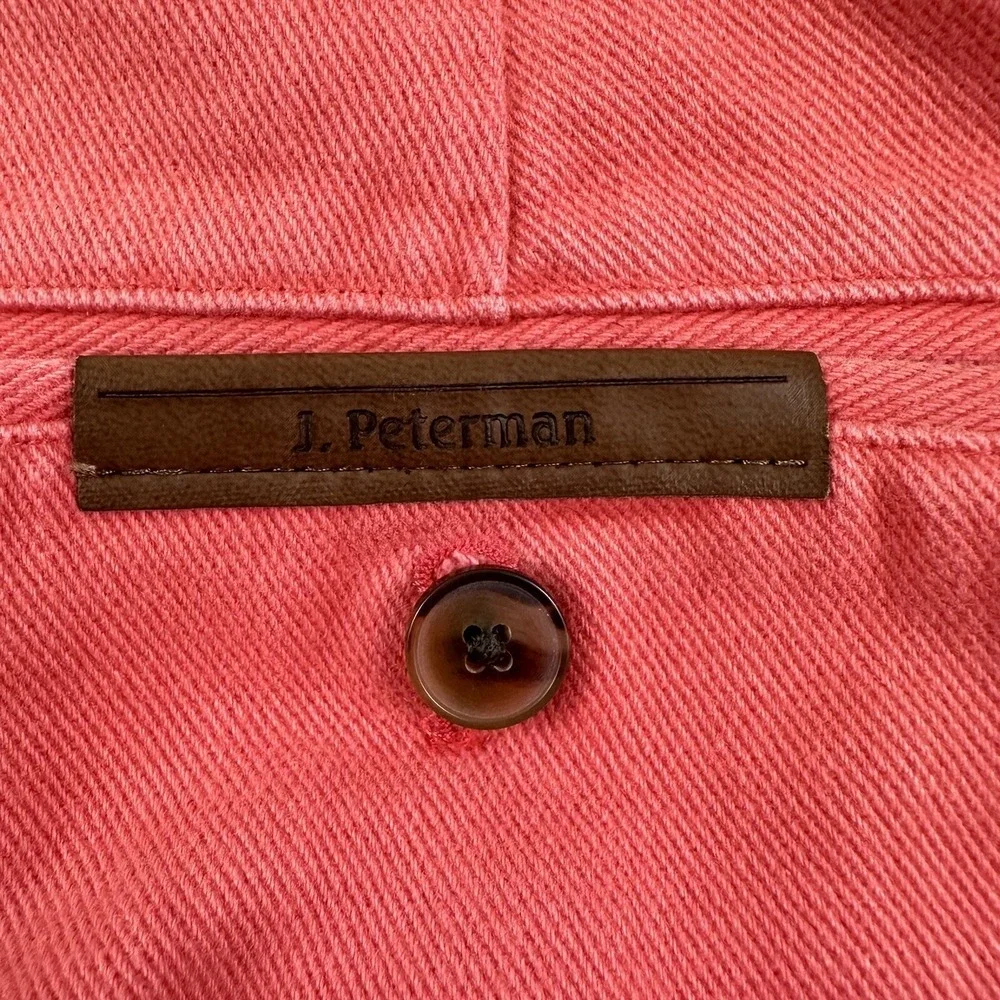 J. Peterman examine photos